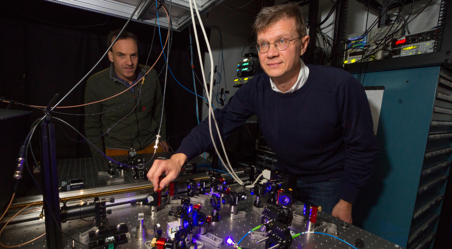 Harvard physicists Mikhail Lukin (foreground) and Markus Greiner